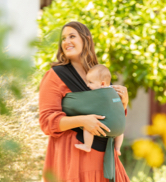 Detailed graphic breakdown of 3-in-1 convertible baby carrier with detachable hip seat and neck support